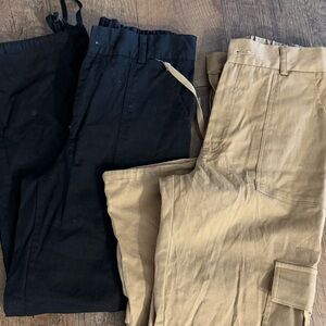 Women's Black and Tan cargo pants new without tags, never worn. Size medium